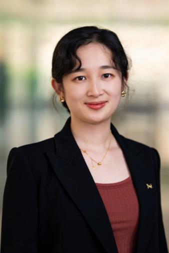 A person in a black jacket

Description automatically generated